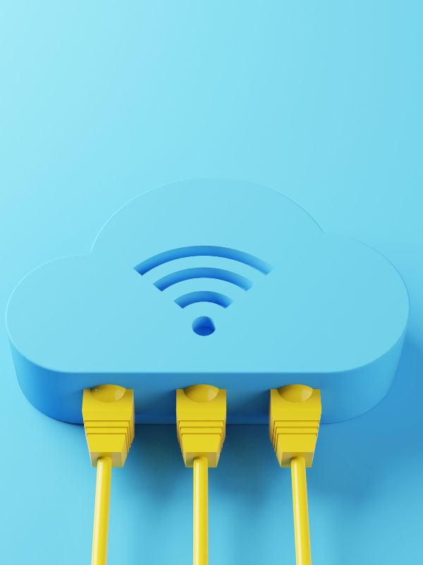 Routter azul claro con tres cables de ethernet conectados